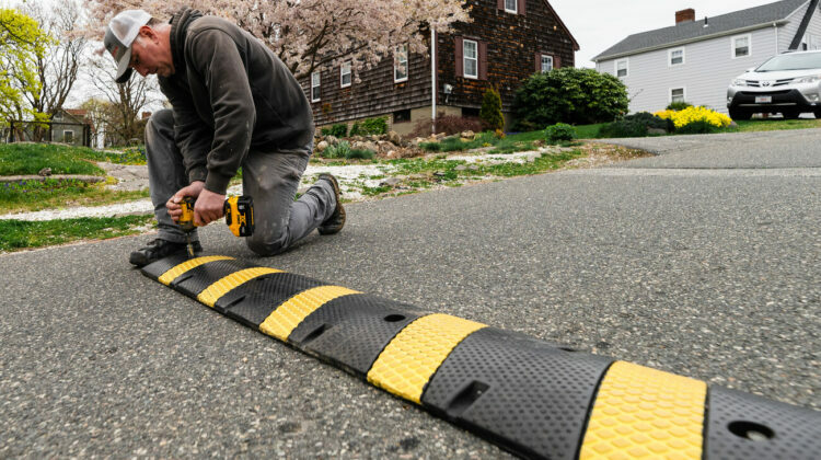 RS235328 4 30 24 Man removes speed bumps in Marblehead 1 web 750x420